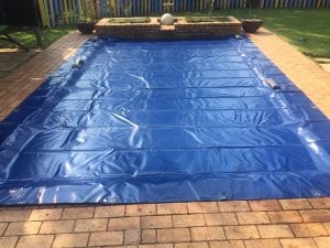 can you put a tarp under an above ground pool